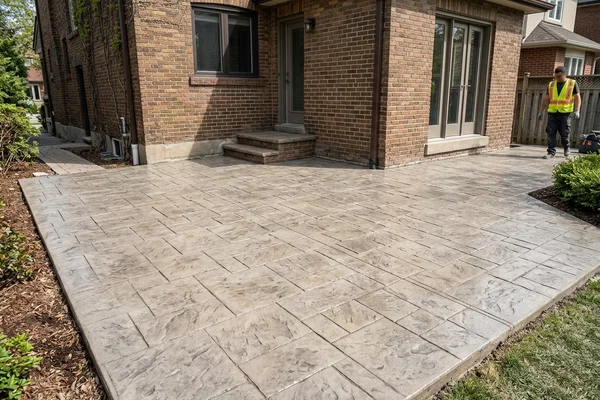 After: Stamped stone-look overlay, sealed