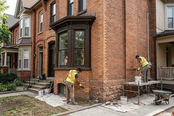 Cabbagetown bay-and-gable facade after lime repointing